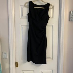 A black sleeveless dress